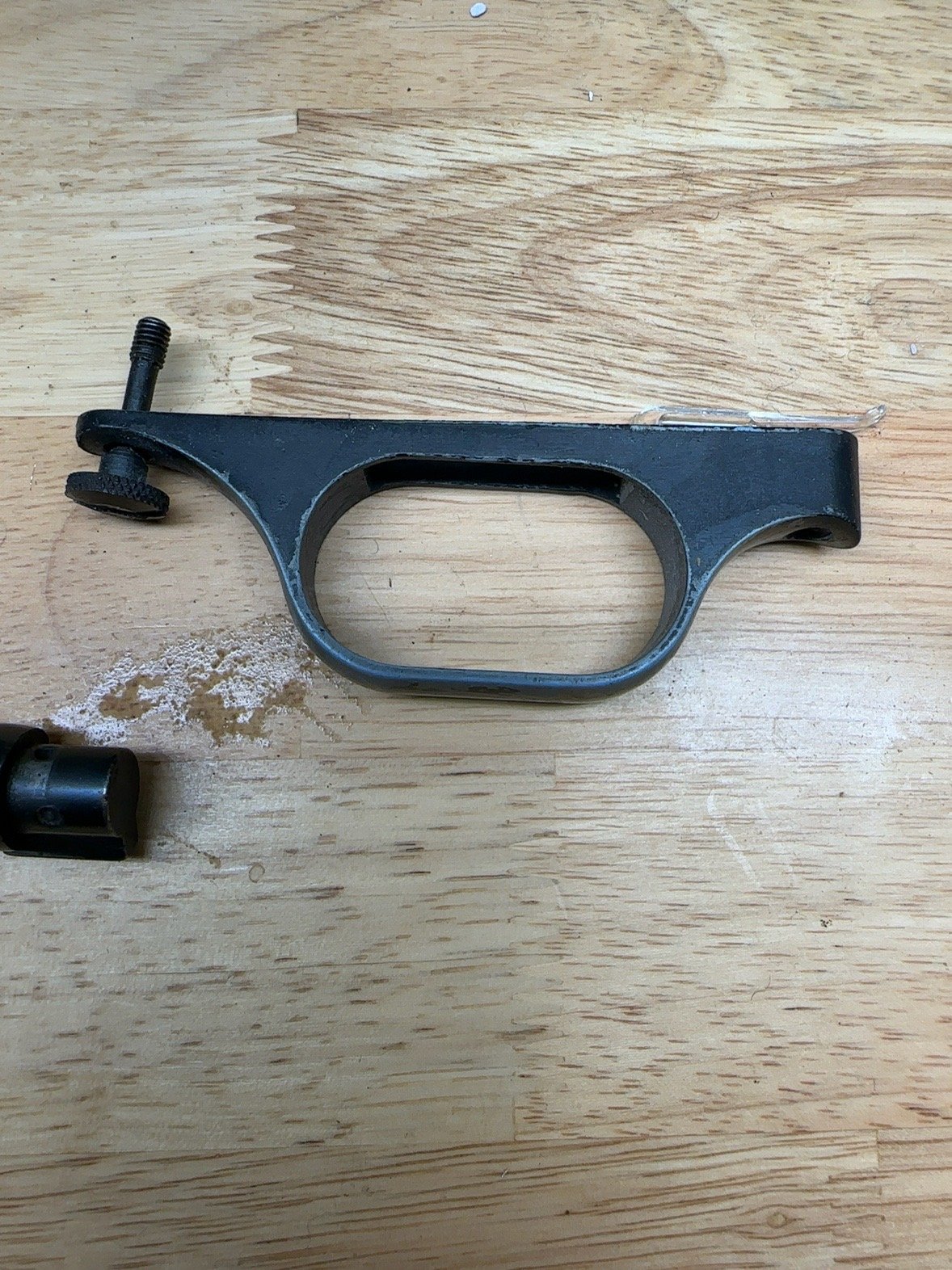 Trigger guard and worn screw from shotgun restoration