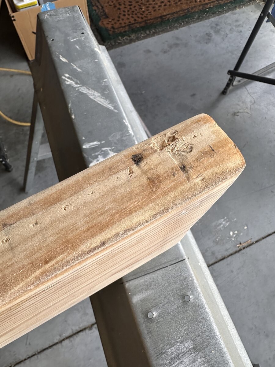 Sanded end and edge of the pine board