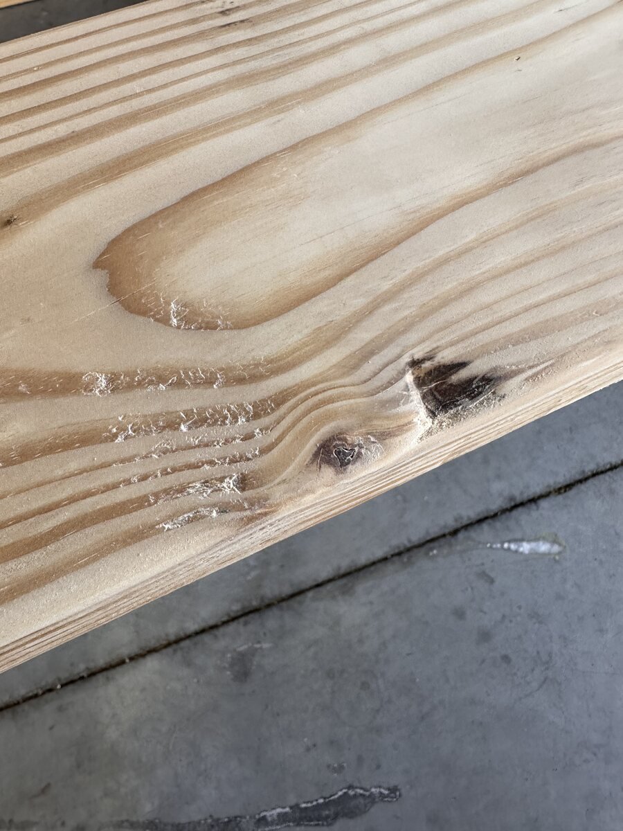 Narrow interruption in otherwise straight grain