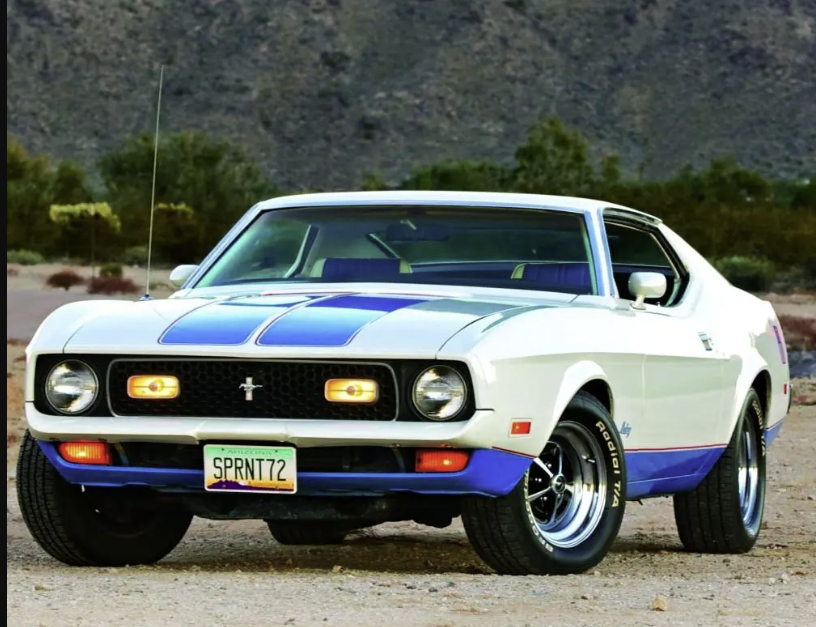 White 1972 Ford Mustang Mach 1 with blue hood and lower-body accents